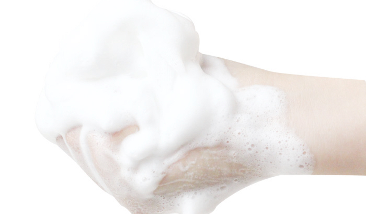 hand with foam