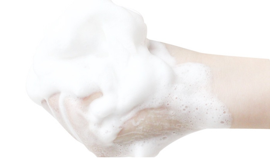 hand with foam